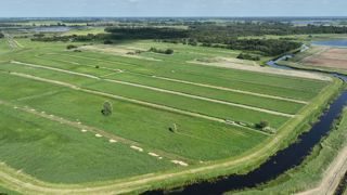 Luchtfoto landbouwpercelen.